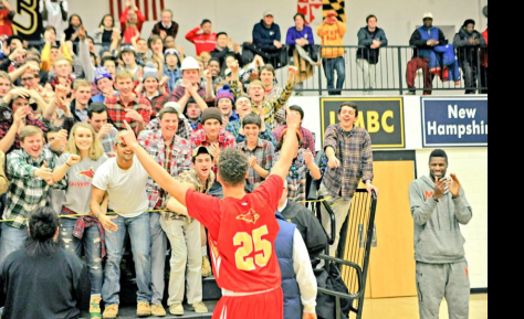 Drew Edwards Calvert Hall student section salute